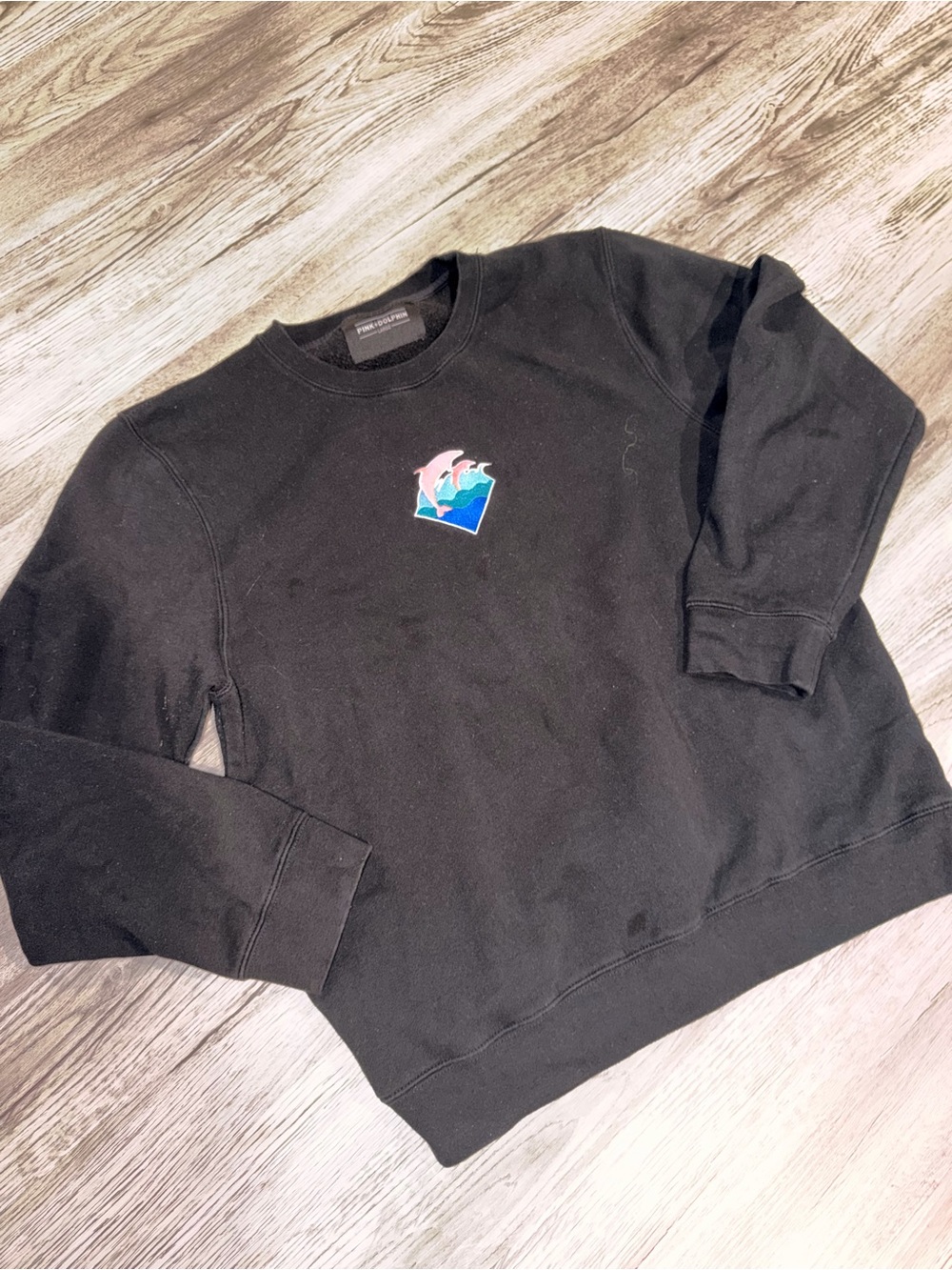 Pink Dolphin Black Crewneck with Blue Wave Dolphin Patch